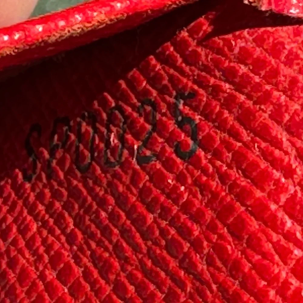 LOUIS VUITTON CARD CASE. RED. GUC